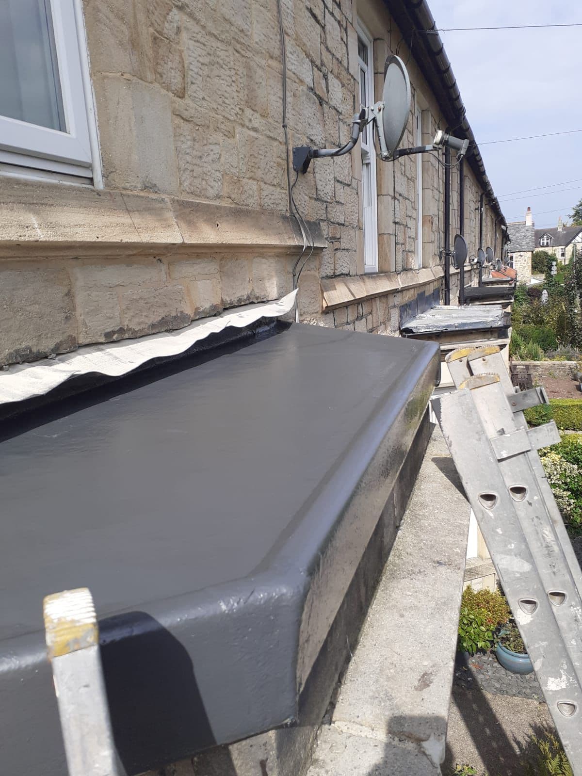 Completed flat roof on a local stone-built property