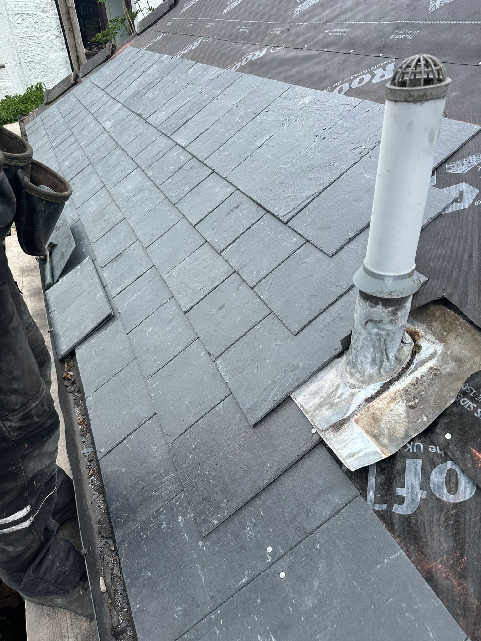 Slate being laid by hand